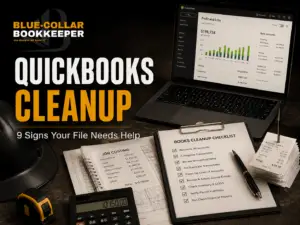A desk with a laptop showing a profit and loss graph, bookkeeping documents, calculator, pen, coffee, and title text: QuickBooks Cleanup—9 Signs Your File Needs Help..
